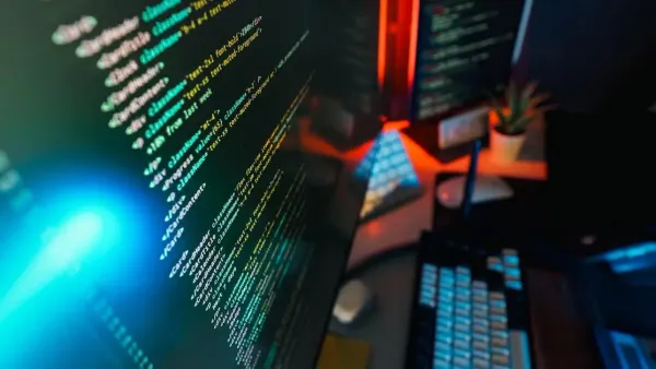 Futuristic workspace with code on screen representing best mcp servers for developers 2026